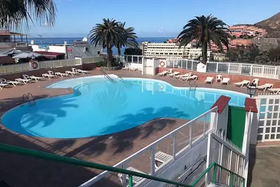 Image de Terrasse au soleil avec vue sur l'océan et accès à la piscine!