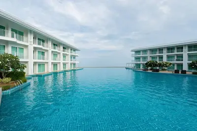 Image de Appartement 1 chambre avec 2 vélos et vue sur la mer, situé à Cha-am, Hua Hin, en bord de mer et de piscine