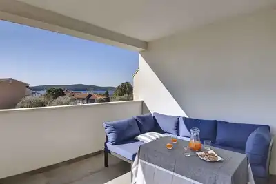 Image de Appartement de vacances avec climatisation et vue sur la mer