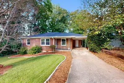 Beautiful brick home with private yard, full kitchen, Ac, & private W/D
