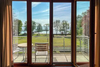 Image de Apartment mit Seeblick - 950 m zum Hundestrand Wiesengeflüster