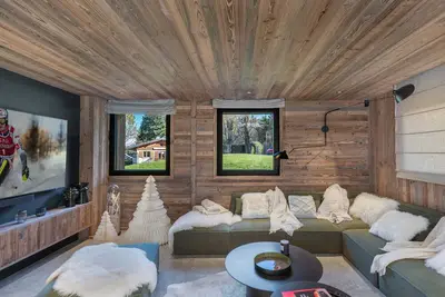 Image de Chalet Neuf pour 12 personnes avec Sauna, Bassin et Salle Cinéma à 800m des Remontées Mécaniques