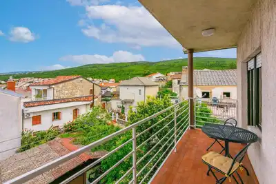 Image de Appartement de vacances avec terrasse et air conditionné