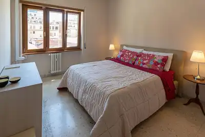 Image de Cozy apartment 10 minutes from the Colosseum for families.