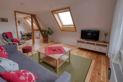 Image de Appartement 'Zum Alten Wärterhaus Obergeschoss' avec vue sur le lac, terrasse partagée et Wi-Fi