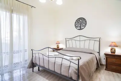 Image de Appartement 'Monti Rossi Home Holidays' avec terrasse privée, balcon et Wi-Fi