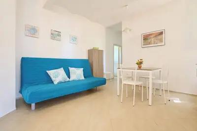 Image de Appartement \"Mare Etrusco 8\" avec jardin partagé et Wi-Fi