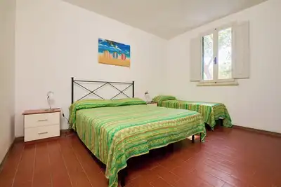 Image de Appartement 'Mare Etrusco 2' avec jardin partagé et Wi-Fi