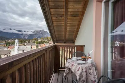 Image de Appartement 'Giongo Residence Aparthotel 202' avec vue sur la montagne, terrasse partagée et Wi-Fi
