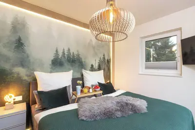 Image de Ferienhaus Sonnenweg 32 - Sauna, Garten und Seeblick Inklusive