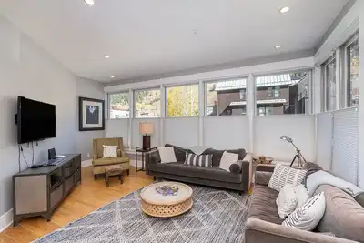 Sunny & Spacious | Wall-to-Wall Windows, Deck, Parking