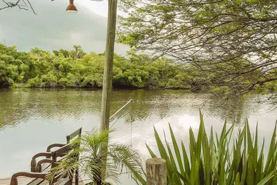 Image de Sobrado a Beira do rio Manpituba com Piscima Quiosques com Churrasqueira