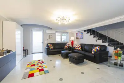 Modern apartment in Chiaia on two levels with panoramic terrace