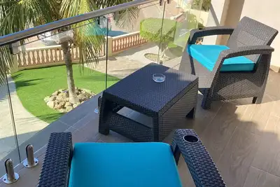 Image de Cozy Apartment a 3 minutes' drive to the Ritz Carlton