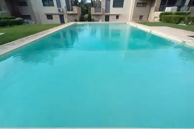 Image de Tolle Ferienwohnung mit Pool und 5 Minuten Spaziergang zum Strand