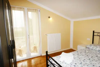 Image de Miralago Apartment. Wonderful two-room apartment with lake view and parking.