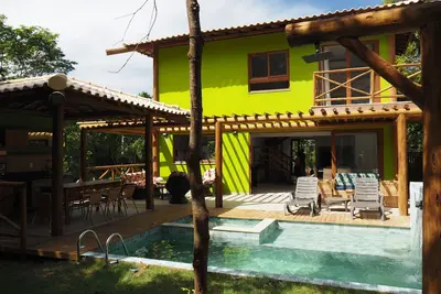 Image de Ferienhaus im Palmenwald - 5 Suiten, Pool, Grillhaus, in 10 Min. am Strand