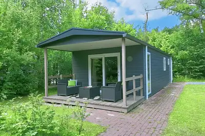 Image de Knus 4 Persoons Chalet met 4 Leenfietsen Nabij Natuurgebieden