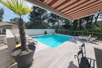 Image de Villa Comète - Maison de famille avec piscine sous la pinède