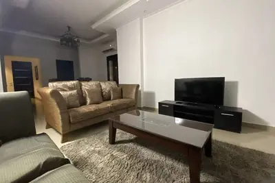 Image de Cozy apartment in a gated community compound in New Cairo.