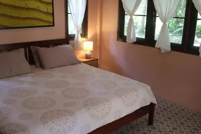 Image de Cozy cottage surrounded by nature next to the beach.