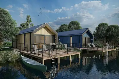 Image de Lodge au Bord du Lac à Arcen avec Terrasse