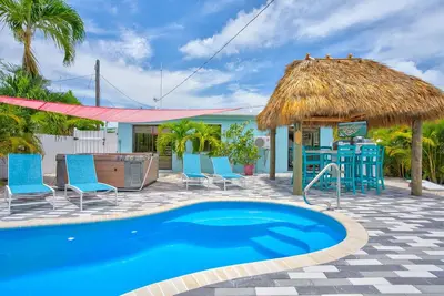 Pool, Spa, 50’ Dock, Game Room & Tiki Hut!