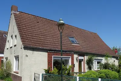 Image de Neu Inseriert! Ferienwohnung Warfthuus in dem Wunderschönen Warftendorf Rysum