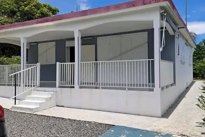 Image de Homerez - Maison confortable à Le Moule avec piscine partagée