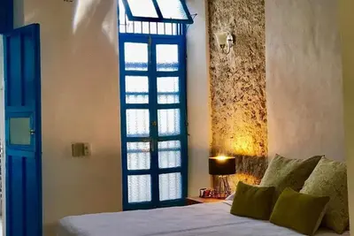 Image de Casita de la 12 5 min a centro Campeche ideal para 2 ó 3 personas Cocina con estufa de inducción, microondas y refrigerador