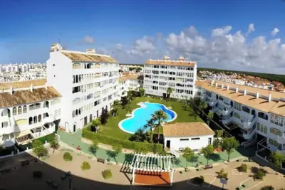Image de Homerez - Appart. El Portil, piscine.
