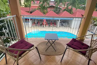 Image de Homerez - Appart Pointe-Noire, piscine.