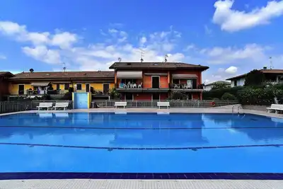 Image de Homerez - Appart. Ă Pacengo, vue sur jardin