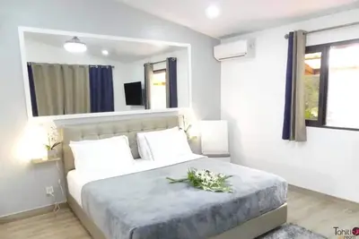 Image de Homerez - Maison à Puna'auia + Vue sur le jardin.