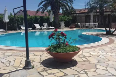 Image de Homerez - Appartement charmant avec piscine à Lago