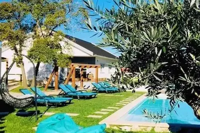 Image de Homerez - Maison spacieuse à Atalaia avec piscine partagée