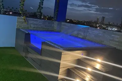 Image de Moderno y Lujoso Apartamento con Jacuzzy Cerca del air Port