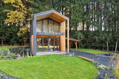 Image de Luxe Timber Lodge & Relaxing Bath” by Interhome