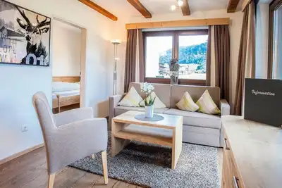 Image de Ferienwohnung Bergglück 52m² 1-4 Nächte - Alpenherz Ferienwohnungen