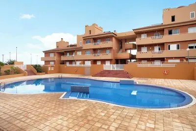 Image de Appartement de vacances 'Beach Front Puertito' avec piscine partagée, terrasse privée et Wi-Fi