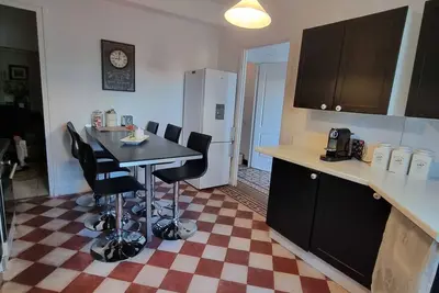 Image de Maison de ville avec rez-de-jardin.