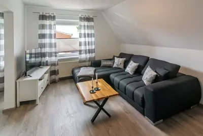 Image de New, modern and maritime - vacation apartment Inselblick31 in Neßmersiel