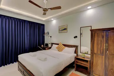 Image de 10 min from Goi airport! Family sized apartment w/deck. Pool. Sauna. Wi-Fi.