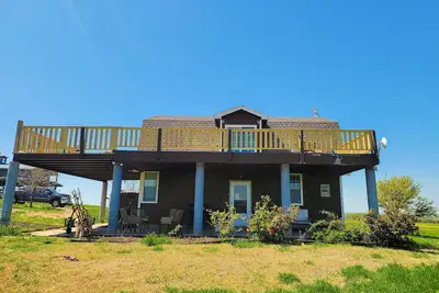 Image de Farmhouse-style home with a balcony, gas grill, separate loft, W/D, and Ac