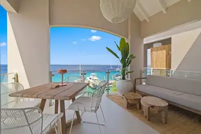 Image de Thuis aan Zee with sea view stylish interior and views of the colorful sunsets