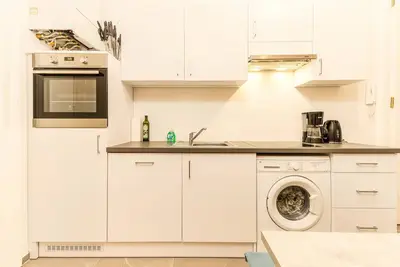 Image de City Apartment - 5 min to Metro