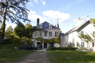 Image de La Maison l'Amérique vous accueille dans l'une de leurs chambres