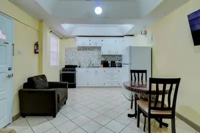 Homely one bedroom apt; fully self-contained steps away from white sand beach