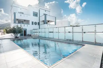 Image de Maison de vacances 'White Pearl Apolakkia 1' avec piscine commune, terrasse partagée et Wi-Fi