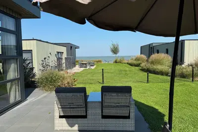 Image de Top modern chalet Sonnenplätzchen, large garden on the IJsselmeer - New with fen